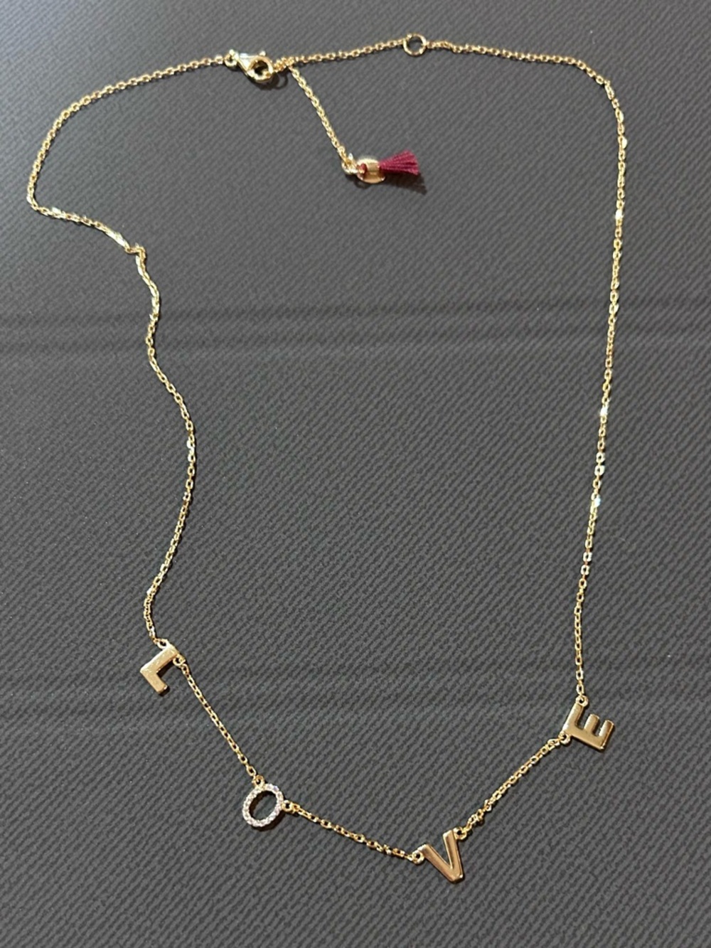 SHASHI Gold and Crystal “LOVE” Necklace